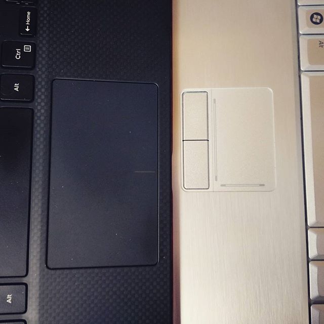Evolution of trackpad size. On the left, a 2015 Dell XPS 13. Right, a 2007 Dell XPS M1330.